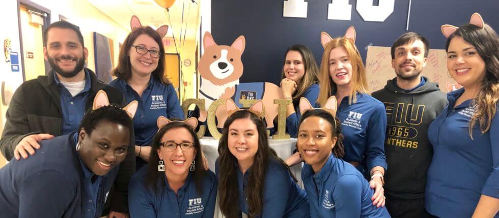 Disability Resource Center staff and the DRC’s new ally, Cori the corgi.